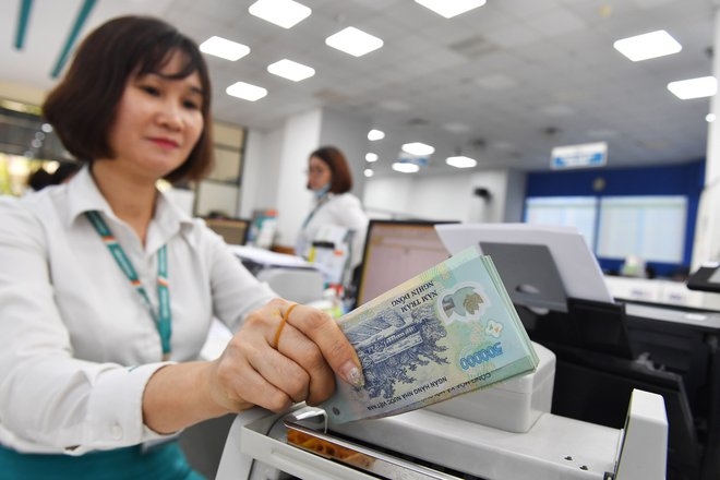 Các ngân hàng đẩy mạnh cho vay chéo với các kỳ hạn 2 tuần đến 3 tháng. Ảnh: Hoàng Hà.